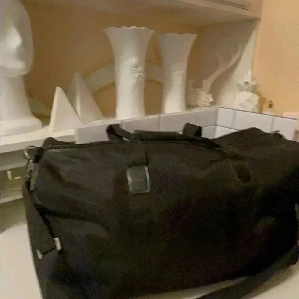 Escoda large travel bag waterproof, long adjustable straps fit a lot of stuff